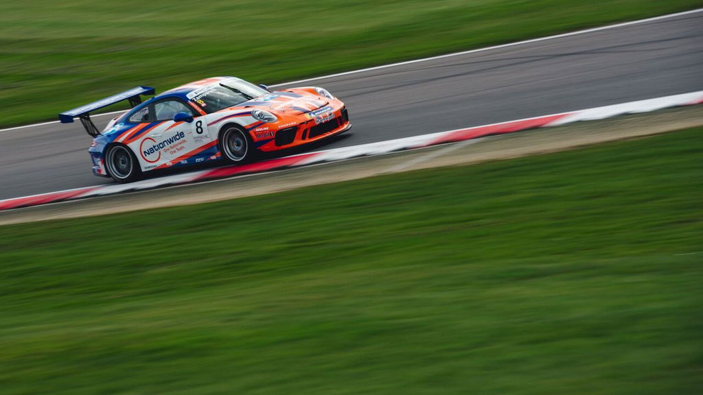 Zamparelli conquers wet conditions to win season opener